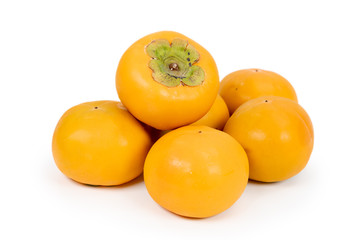 Fresh sweet persimmon fruit isolated on white background.
