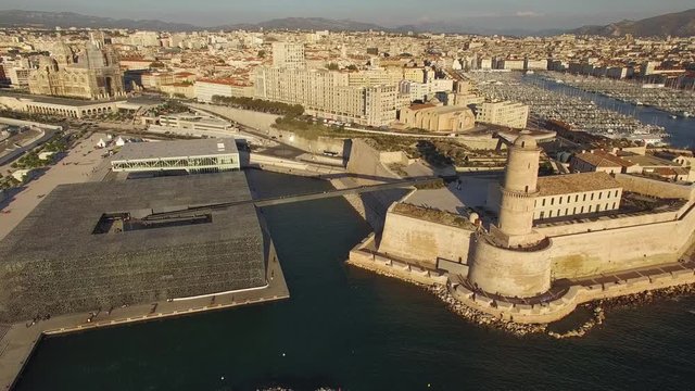 Slow horizontal tracking aerial shot of Fort Saint Jean and the Civilization Museum in Marseille