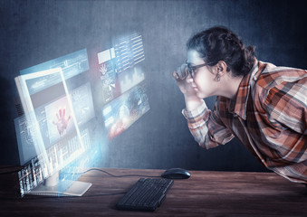 The woman in face to computer