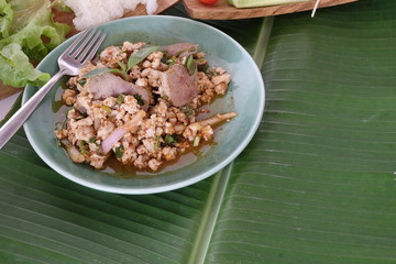 Traditional Thai food spicy minced pork salad, minced pork mash with spicy.