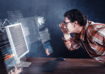 The woman in face to computer