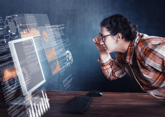 The woman in face to computer