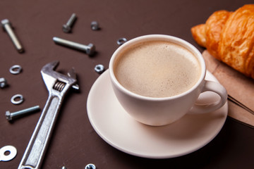 Coffee break, morning coffee. Repair service concept. Technical support. Different tools wrench