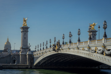 Fototapeta na wymiar Paris, France - 10 13 2018: The Alexander III bridge, bathed in sunshine
