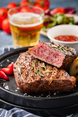 Steak beef. Beef steak medium with red pepper, aromatic herbs and fried onion