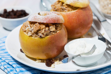healthy breakfast. oatmeal baked in apple, closeup