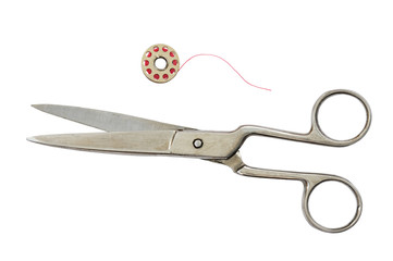 Set of old vintage scissors and a spool