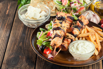 Chicken Souvlaki with french fries and tzatziki sauce