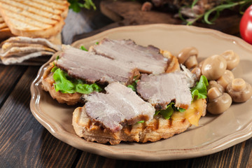 Sandwich with baked pork belly