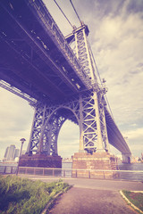 Fototapeta premium Vintage toned picture of Manhattan Bridge at sunset, New York City, USA.