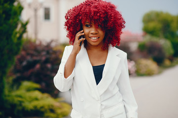 Black girl in a summer park