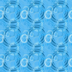 Seamless background pattern with various colored circles.