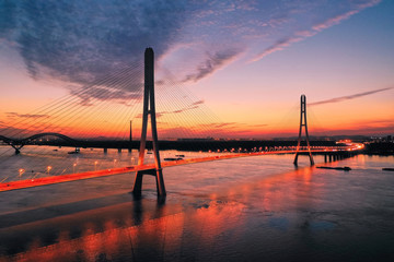 Fototapeta na wymiar Sunset at The Third Nanjing Yangtze River Bridge Seen From A Drone