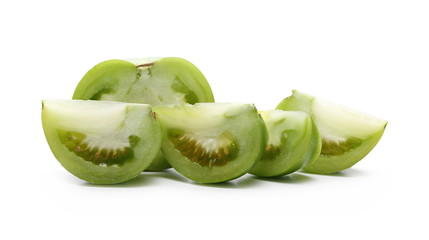 Fresh green tomato slices isolated on white background