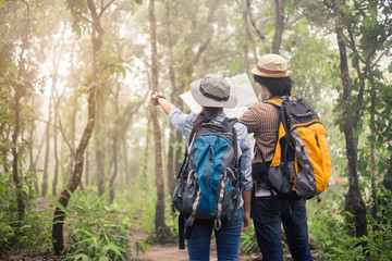 Two Young Tourists With Backpacks Sightseeing nature