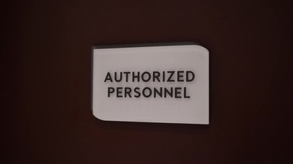 Authorized personnel sign brown background.mov