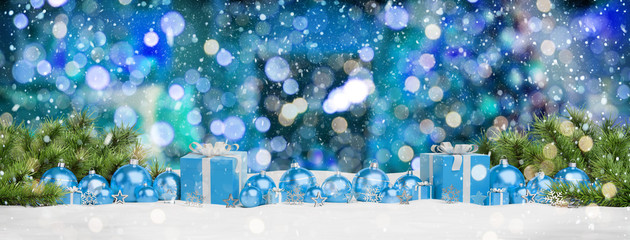 Blue christmas baubles and gifts lined up 3D rendering