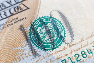 Close-up view on one hundred dollar bill. Macro view on one hundred dollar banknote