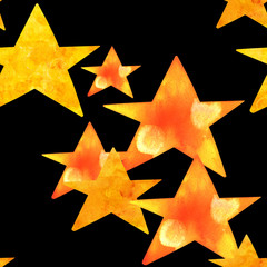 Obraz premium A seamless pattern with golden yellow watercolour stars on a black background, a starry repeat print