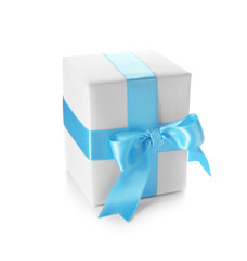 Gift box with blue ribbon on white background