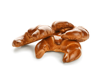 Tasty fresh crescent rolls on white background