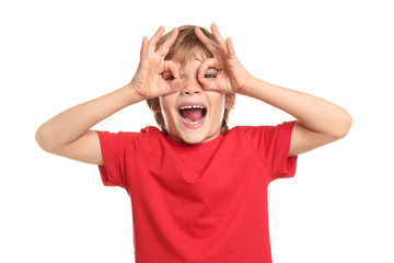 Funny little boy in t-shirt on white background