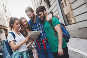Happy tourists travelling and sightseeing