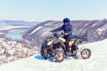 Travel in the winter on the ATV. Beautiful winter nature.