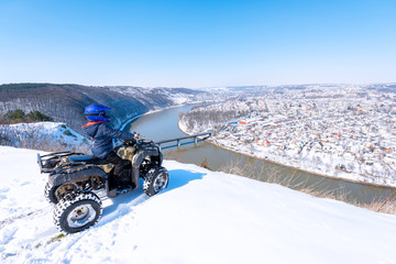 Travel in the winter on the ATV. Beautiful winter nature. © Ахтем