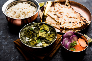 Palak Paneer Curry made up of spinach and cottage cheese served in a bowl or pan with roti or rice