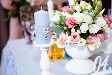 Beautiful decorated wedding restaurant for marriage. Colorful decoration for celebration. Beauty bridal interior. Concept of style of banquet hall