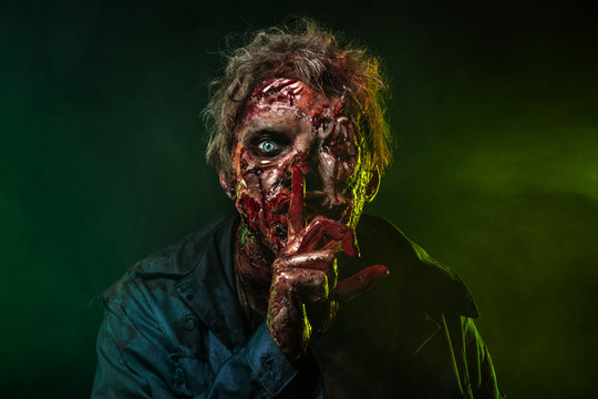 Close-up portrait of a horrible scary zombie man. Horror. Halloween 2018