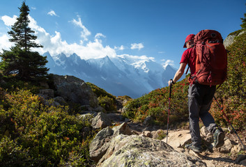 A man hiking on the famous Tour du Mont Blanc near Chamonix, France.