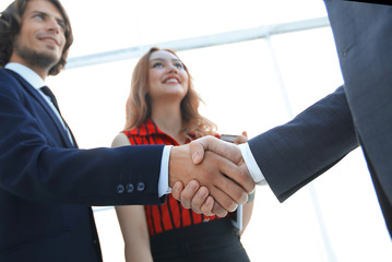 Businessmen handshaking after good deal. Business concept