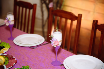 Beautiful decorated wedding restaurant for marriage. Colorful decoration for celebration. Beauty bridal interior. Concept of style of banquet hall