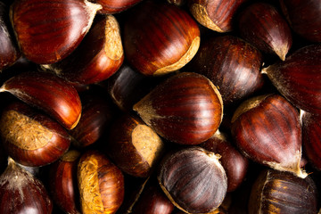 Chestnuts on a pile making background