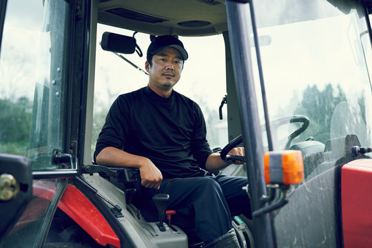 Portrait of man in tractor