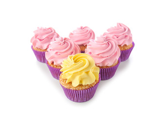 Delicious cupcakes on white background