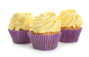 Delicious lemon cupcakes on white background