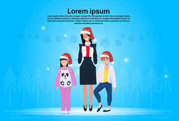 Mother with daughters red hat hold gift box happy new year merry christmas concept flat female cartoon character blue background full length copy space horizontal vector illustration