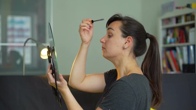 Young Woman Dye Eyelashes