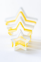 Cloase up star shaped pastry cutter on a white background