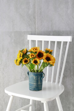 Bouquet of sunflowers on grey stone background