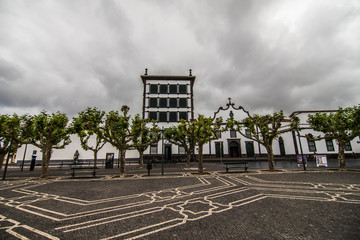 Obraz premium PONTA DELGADA, PORTUGAL - July, 2018: City Gates at the historical center of Ponta Delgada, the capital of Azores Islands.
