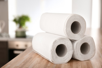 Rolls of paper towels on kitchen table