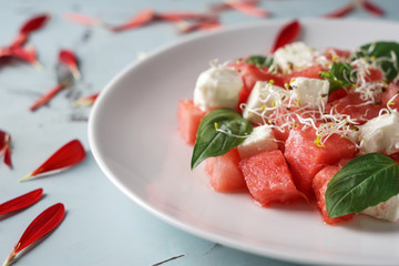 Delicious watermelon salad on plate, closeup