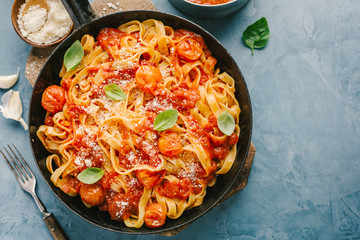 Tomato sauce spaghetti pasta on pan