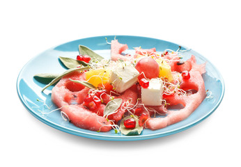 Plate with delicious watermelon salad on white background