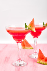 Watermelon margarita cocktail on white background. Fresh watermelon lemonade