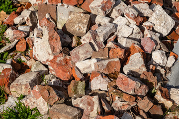 Broken red brick. Construction waste